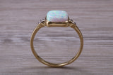 Opal and Diamond White Cubic Zirconia set Trilogy ring, solid 9ct Yellow Gold, very fiery oval cut Cultured Opal