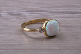 Opal and Diamond White Cubic Zirconia set Trilogy ring, solid 9ct Yellow Gold, very fiery oval cut Cultured Opal