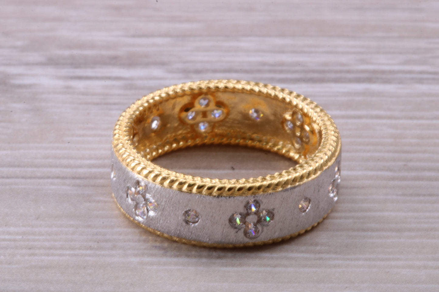 Sterling Silver Gold 7 mm wide band, 18ct Yellow Gold plated and set with Diamond White C Z
