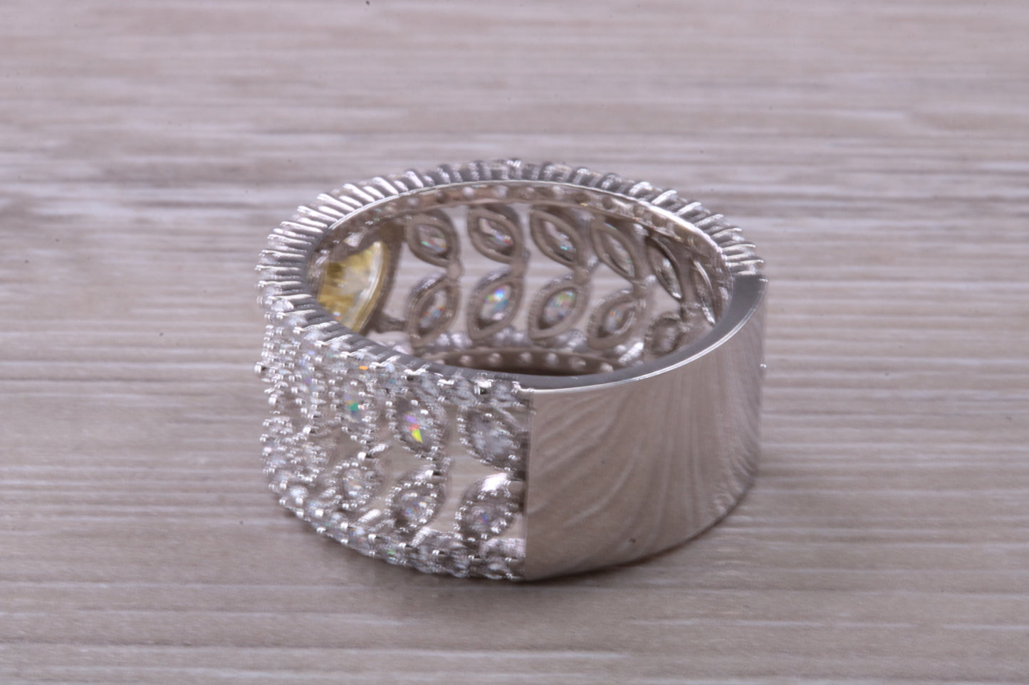 Beautiful and absolutely stunning ring, set with top grade Diamond White and Yellow C Z, Rhodium plated