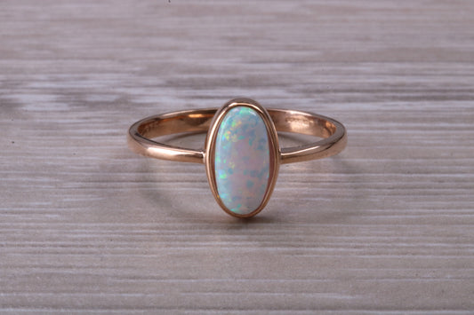 Rose Gold Opal set ring, solid 9ct Rose Gold, British Hallmarked, very fiery oval cut Cultured Opal