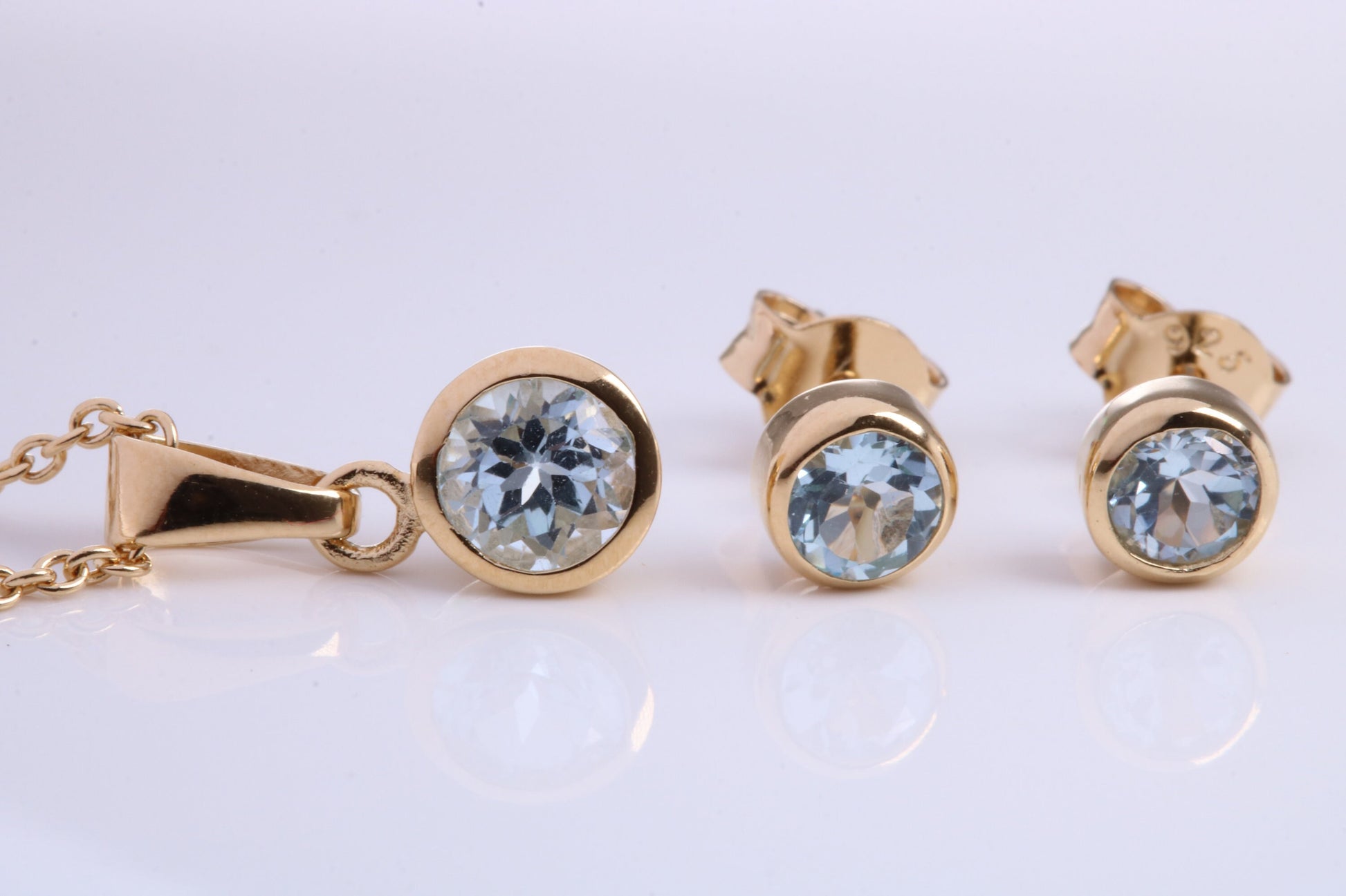 March Aquamarine C Z set Necklace and Matching Stud Earrings, made from solid Sterling Silver and 18ct Yellow Gold Plated