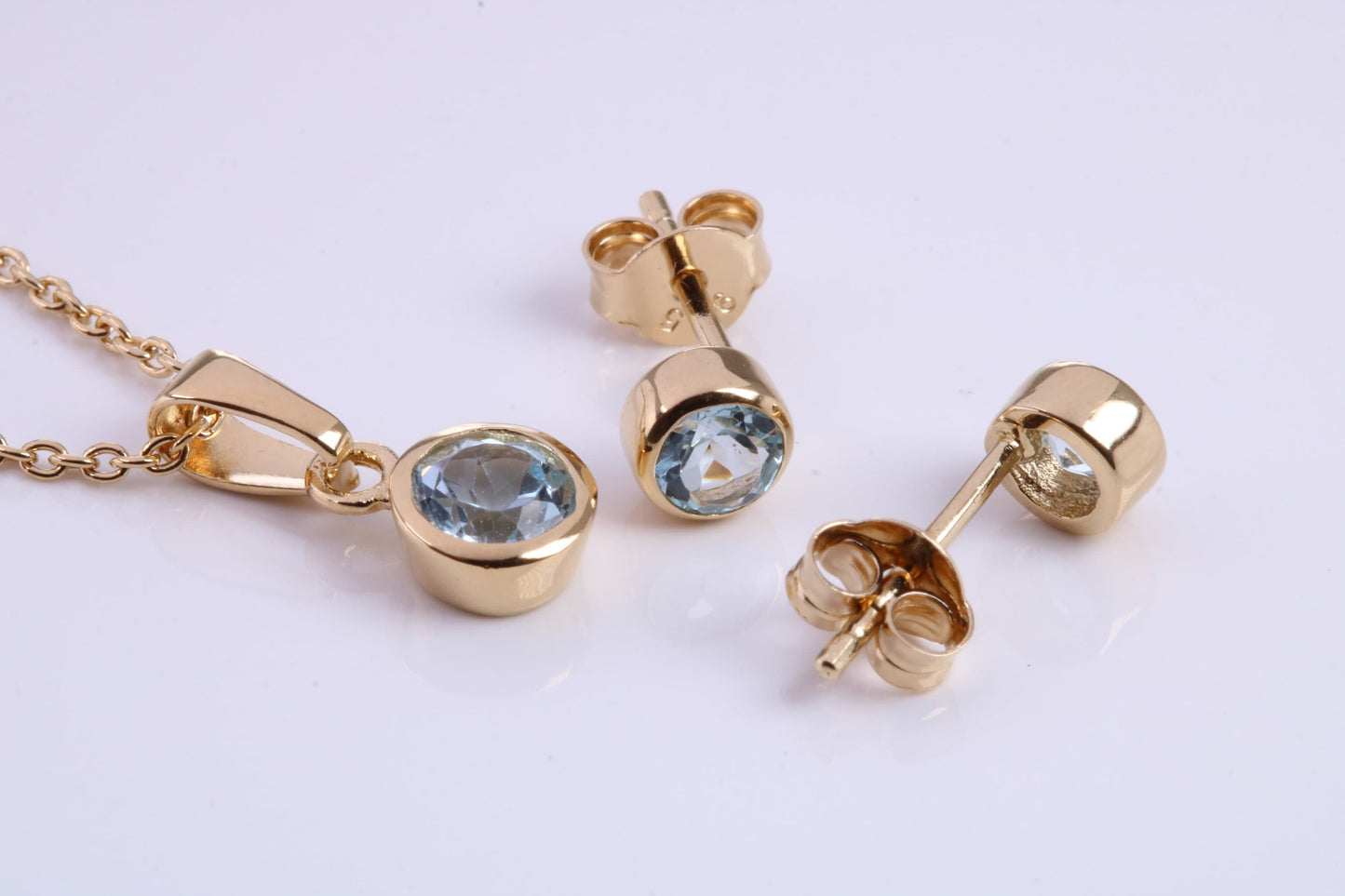 March Aquamarine C Z set Necklace and Matching Stud Earrings, made from solid Sterling Silver and 18ct Yellow Gold Plated