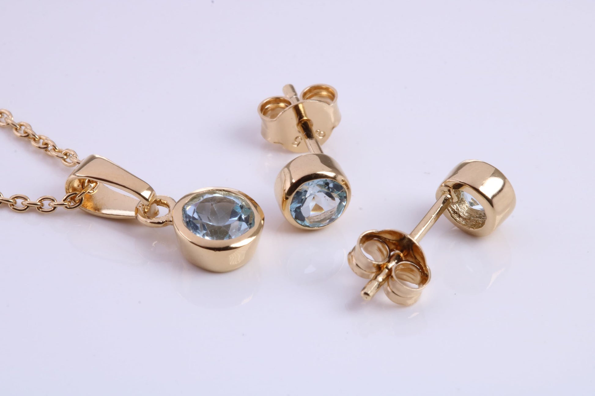 March Aquamarine C Z set Necklace and Matching Stud Earrings, made from solid Sterling Silver and 18ct Yellow Gold Plated