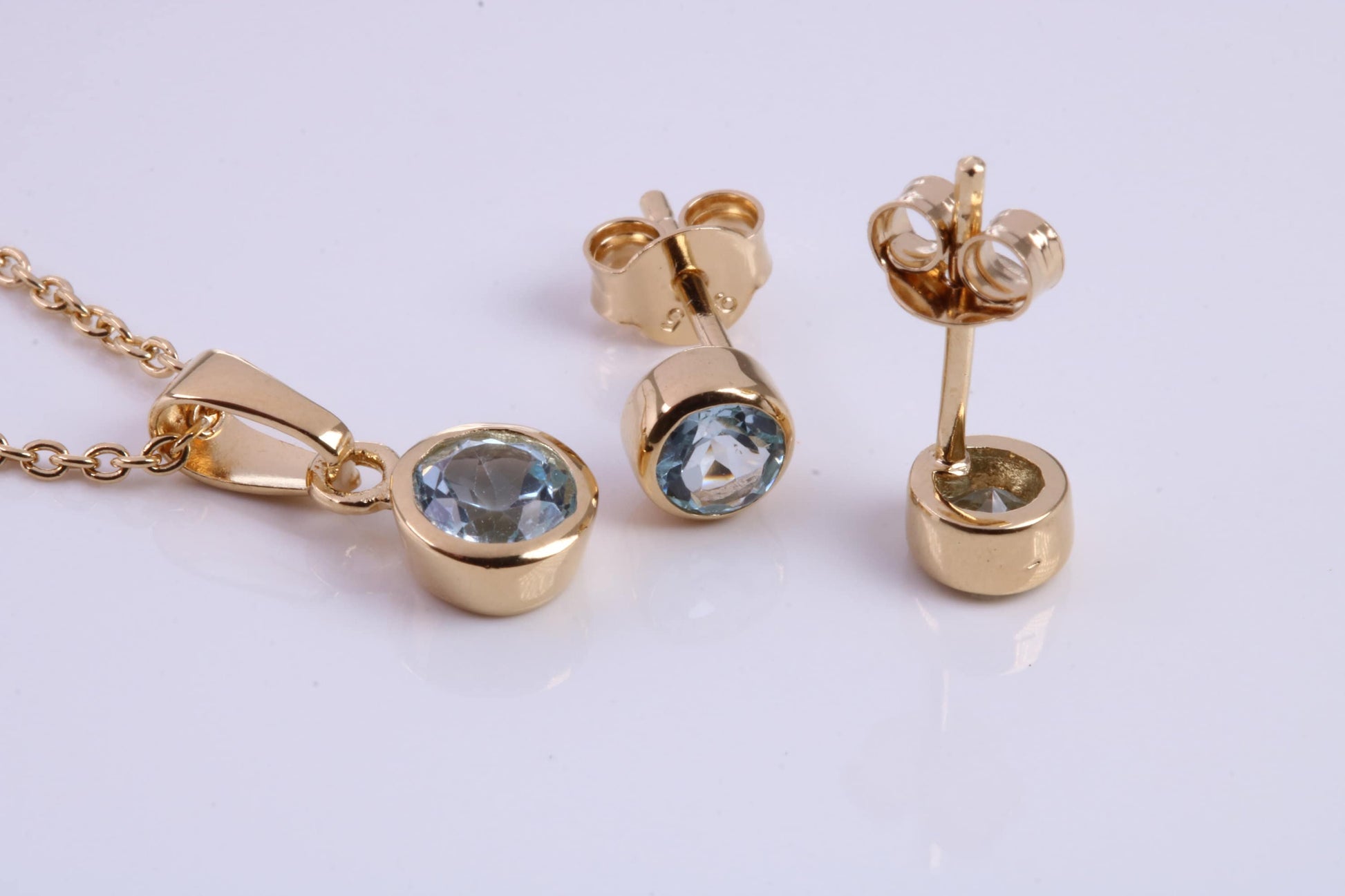March Aquamarine C Z set Necklace and Matching Stud Earrings, made from solid Sterling Silver and 18ct Yellow Gold Plated