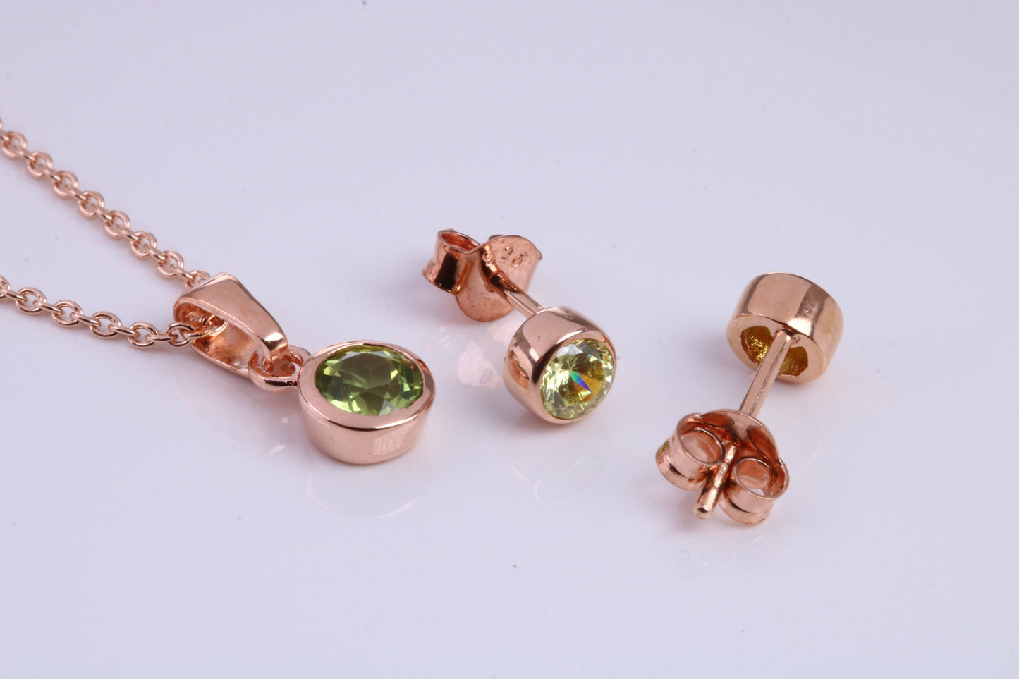 August Peridot C Z set Necklace and Matching Stud Earrings, made from solid Sterling Silver and 18ct Rose Gold Plated