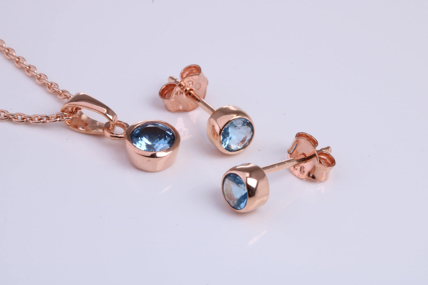December Blue Zircon C Z set Necklace and Matching Stud Earrings, made from solid Sterling Silver and 18ct Rose Gold Plated