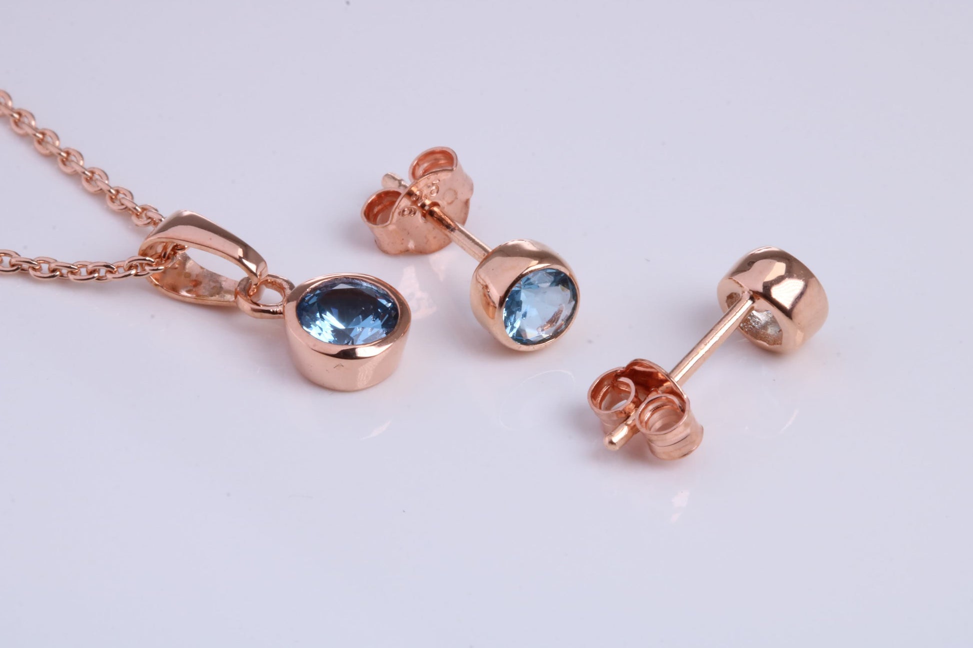 December Blue Zircon C Z set Necklace and Matching Stud Earrings, made from solid Sterling Silver and 18ct Rose Gold Plated