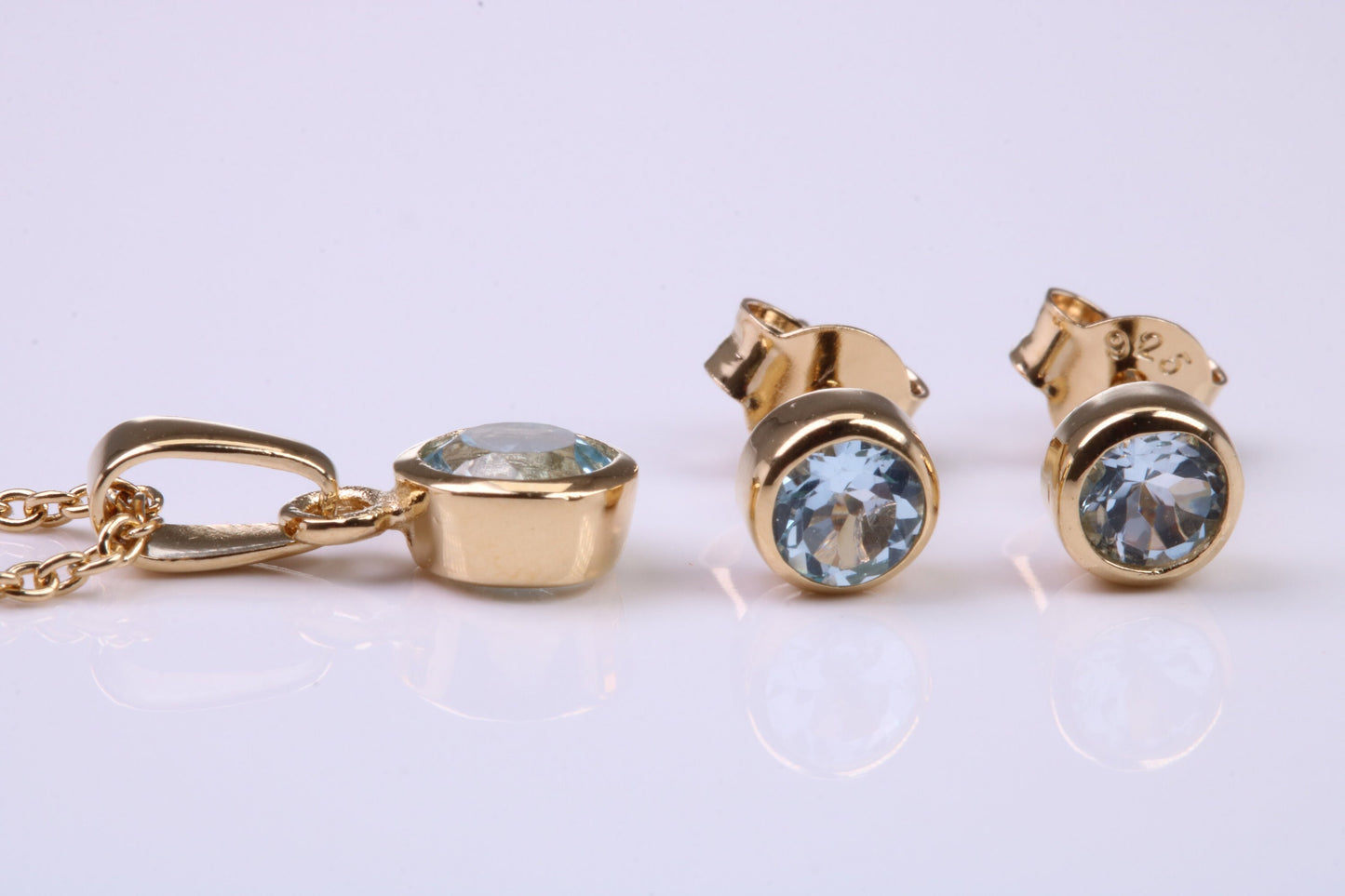 March Aquamarine C Z set Necklace and Matching Stud Earrings, made from solid Sterling Silver and 18ct Yellow Gold Plated