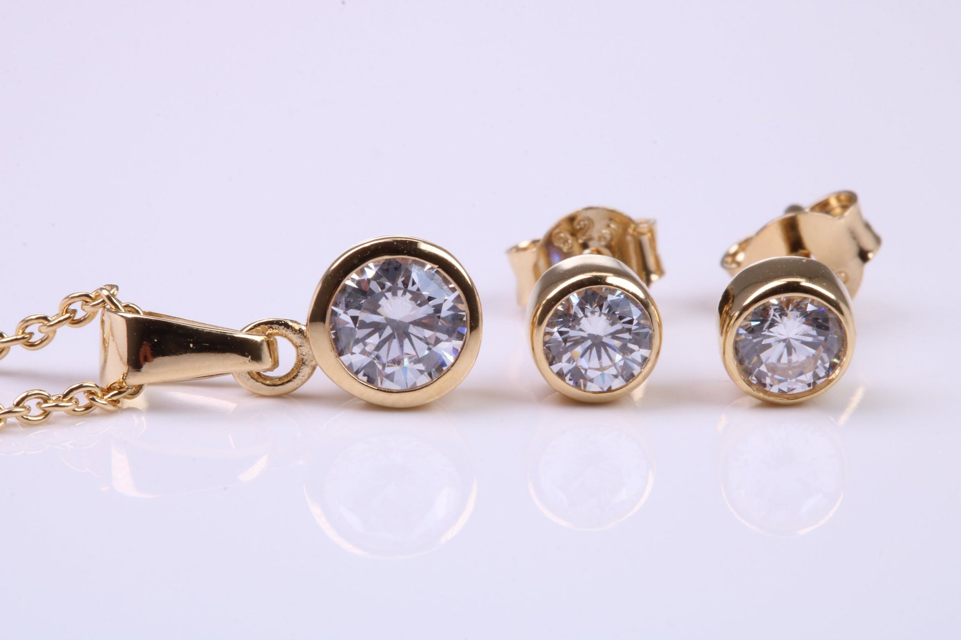 April Diamond C Z set Necklace and Matching Stud Earrings, made from solid Sterling Silver and 18ct Yellow Gold Plated