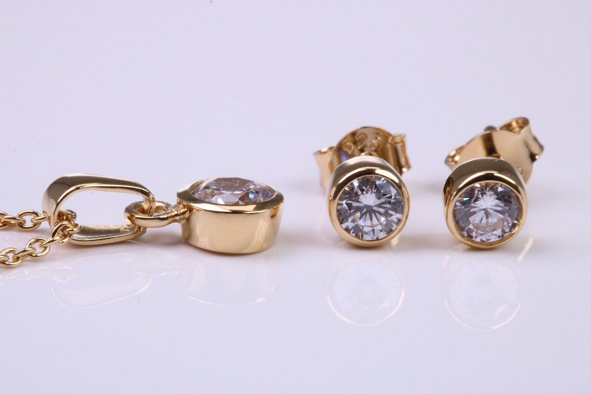 April Diamond C Z set Necklace and Matching Stud Earrings, made from solid Sterling Silver and 18ct Yellow Gold Plated