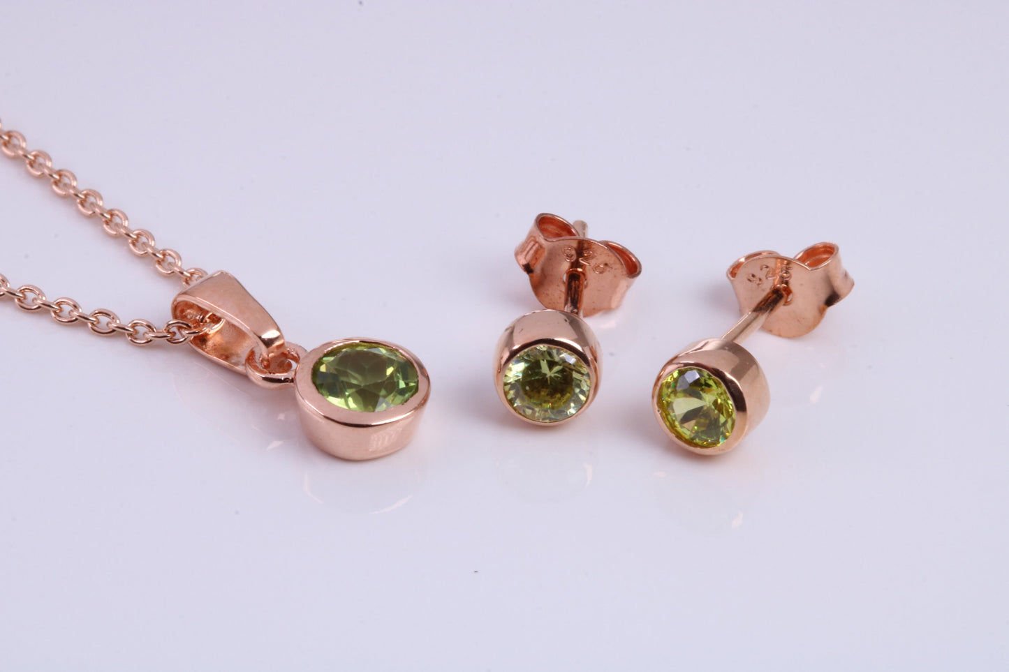 August Peridot C Z set Necklace and Matching Stud Earrings, made from solid Sterling Silver and 18ct Rose Gold Plated
