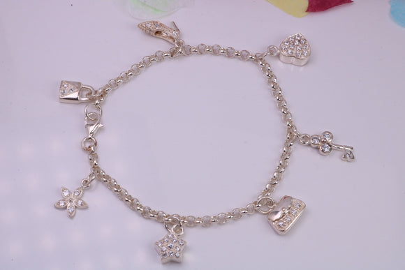 Charms Bracelet, Ready to Wear with Seven C Z set Charms, made from solid Sterling Silver, 7.50 Inches Long