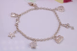 Charms Bracelet, Ready to Wear with Seven C Z set Charms, made from solid Sterling Silver, 7.50 Inches Long