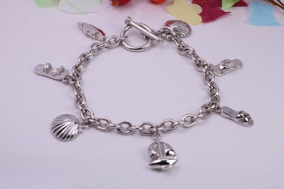 Ready to Wear Charms Bracelet, With Seven Charms Attached, Made from solid Sterling Silver, 7.50 Inches Long, Good Weighty Feel