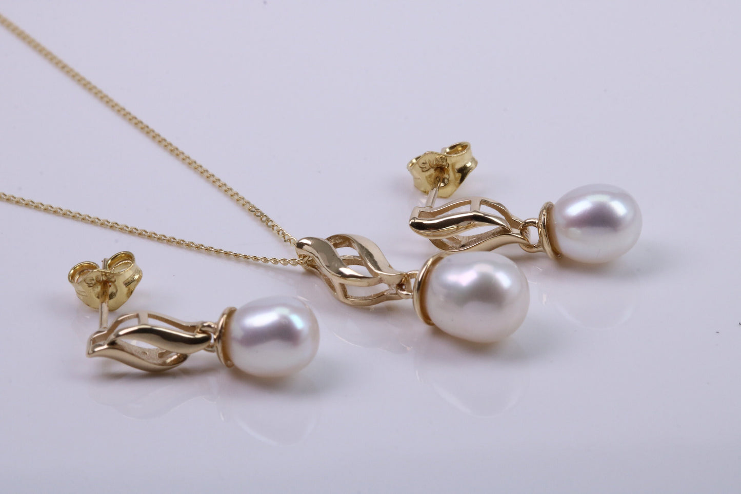 Real Pearl Necklace and Matching Earrings set in Solid Yellow Gold Together with 18 Inch Yellow Gold Chain