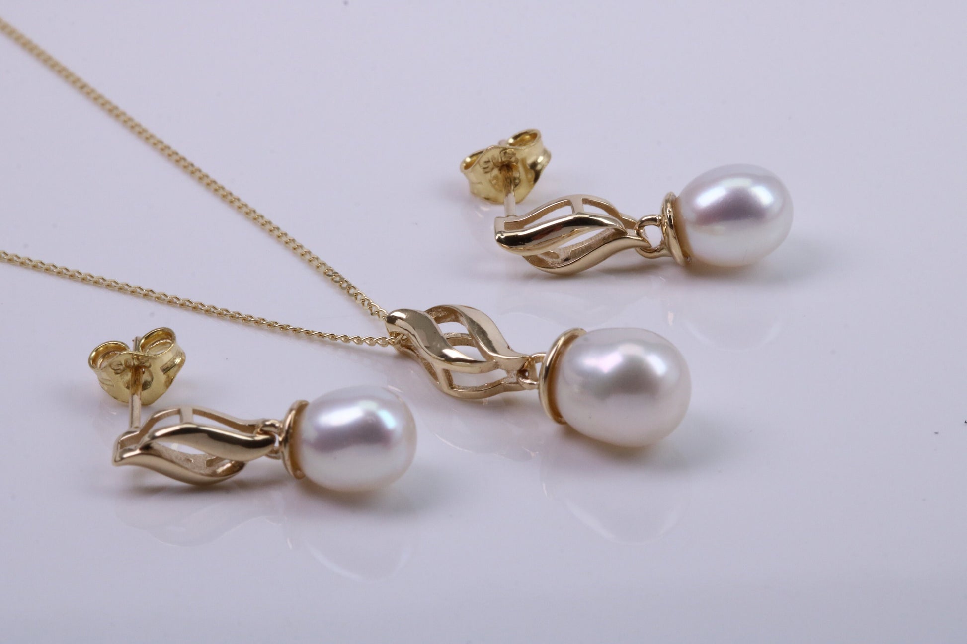 Real Pearl Necklace and Matching Earrings set in Solid Yellow Gold Together with 18 Inch Yellow Gold Chain