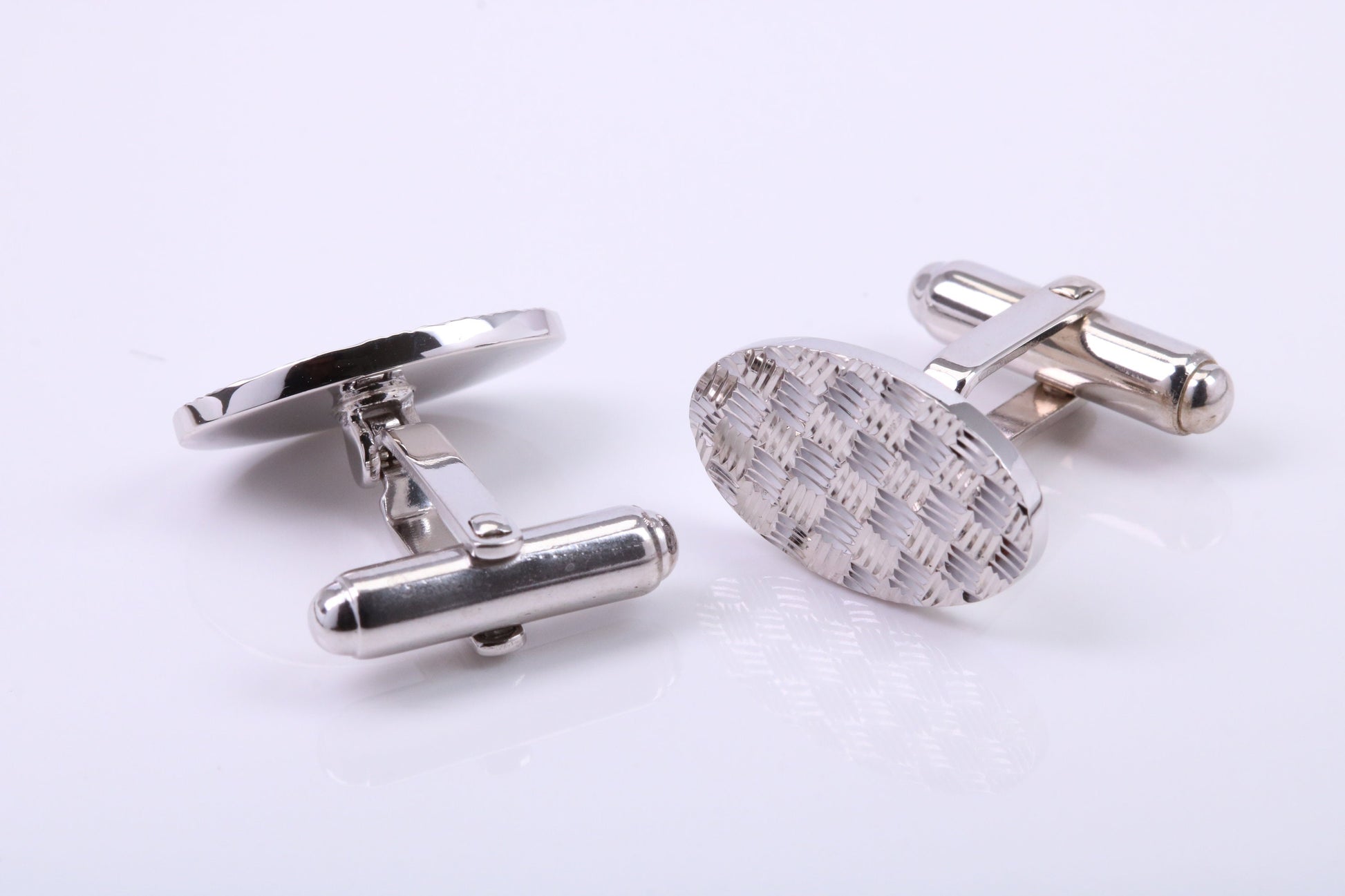 Machine Patterned Oval Shaped Solid Silver Cufflinks
