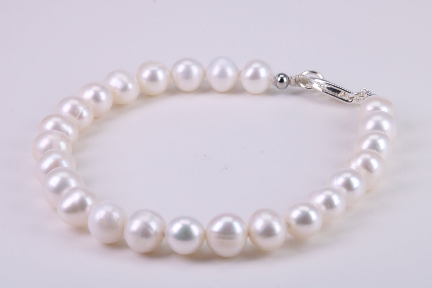 Natural 7 inches Long Pearl Bracelet, made from Sterling Silver