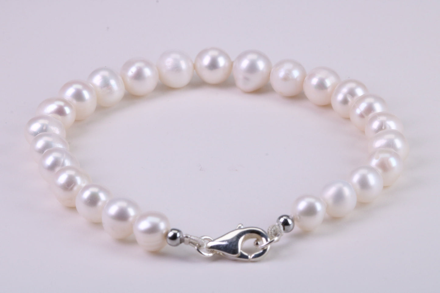 Natural 7 inches Long Pearl Bracelet, made from Sterling Silver