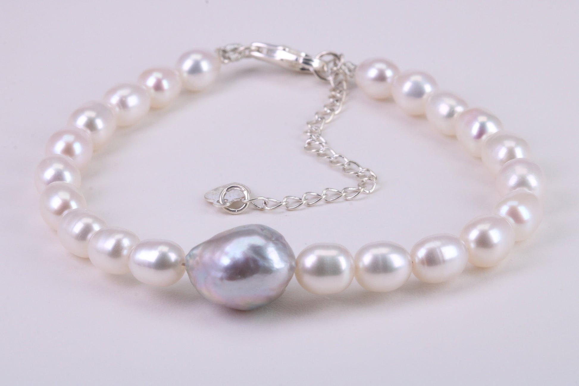 Natural Oval Shaped Pearl Bracelet, made from Sterling Silver with length Adjustable Chain