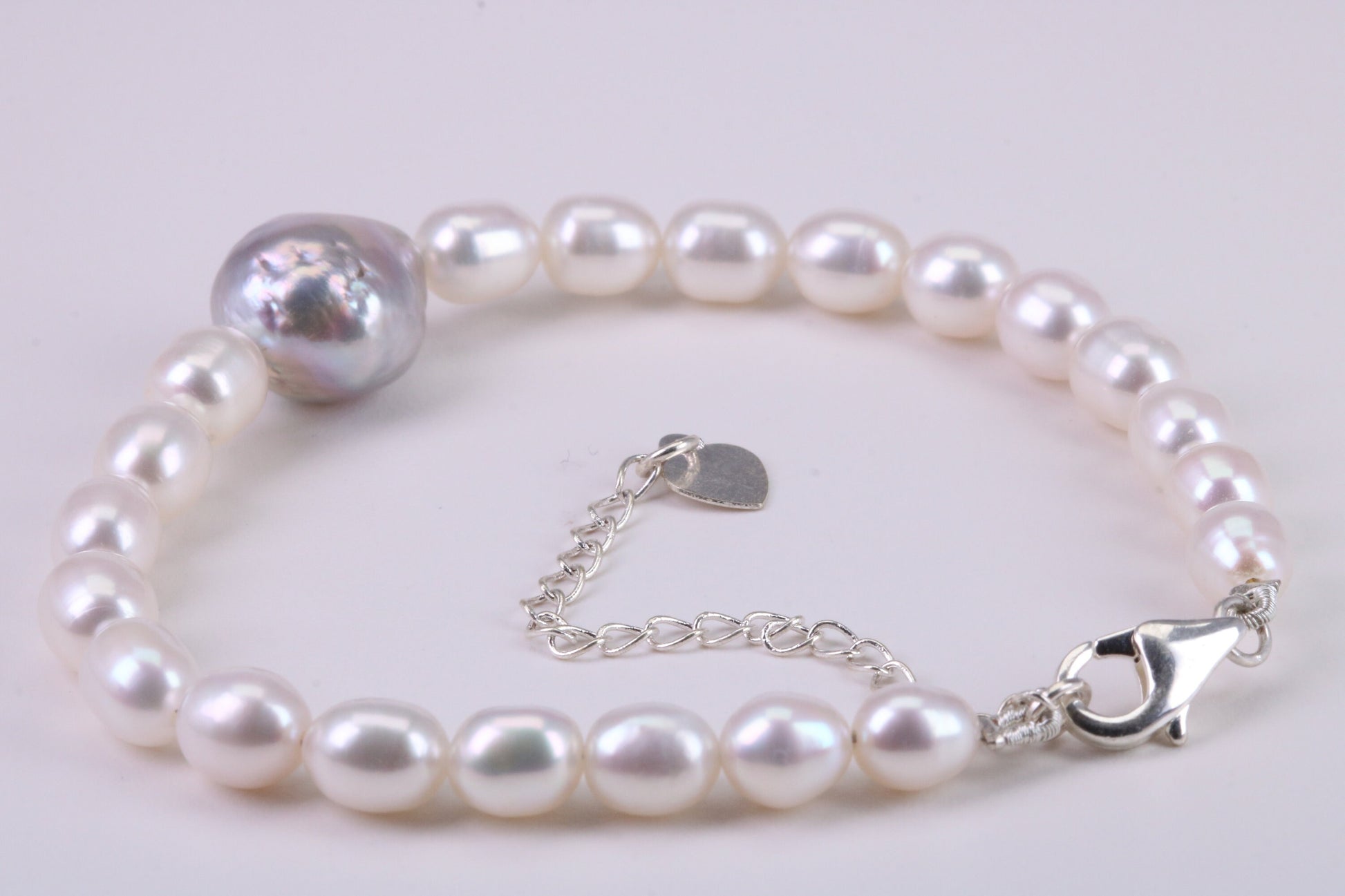 Natural Oval Shaped Pearl Bracelet, made from Sterling Silver with length Adjustable Chain