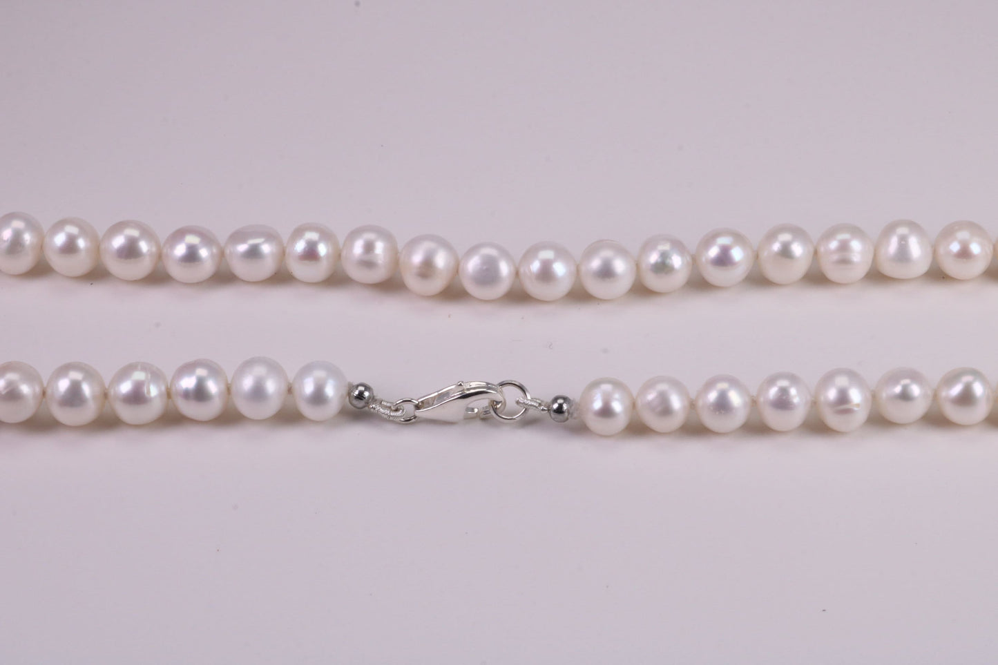 16 Inches Long Single Strand Natural 8 mm Round Pearl Necklace set in Silver