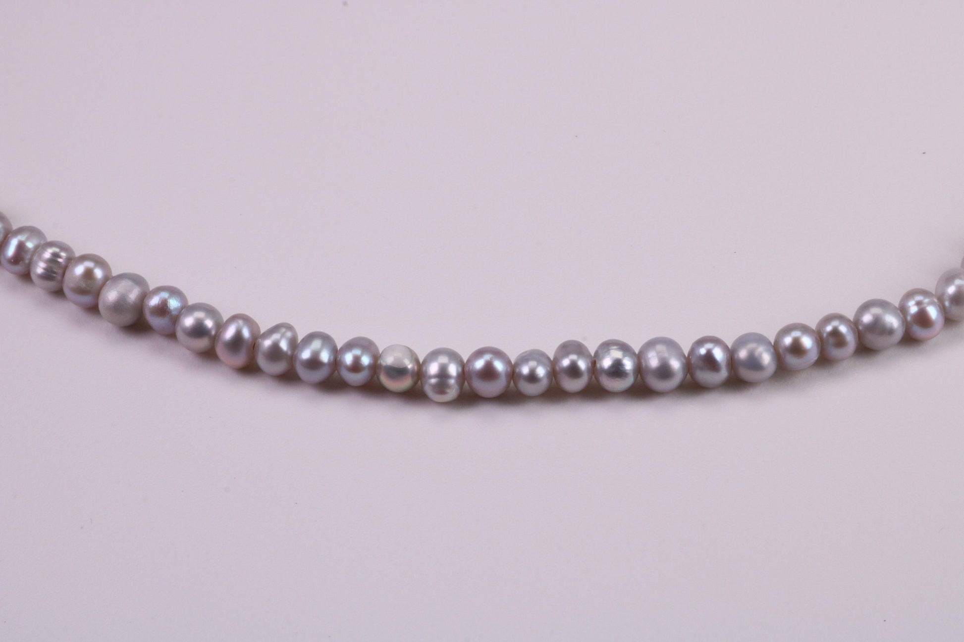 16 Inches Long Single Strand Natural 5 mm Round Grey Pearl Necklace set in Silver