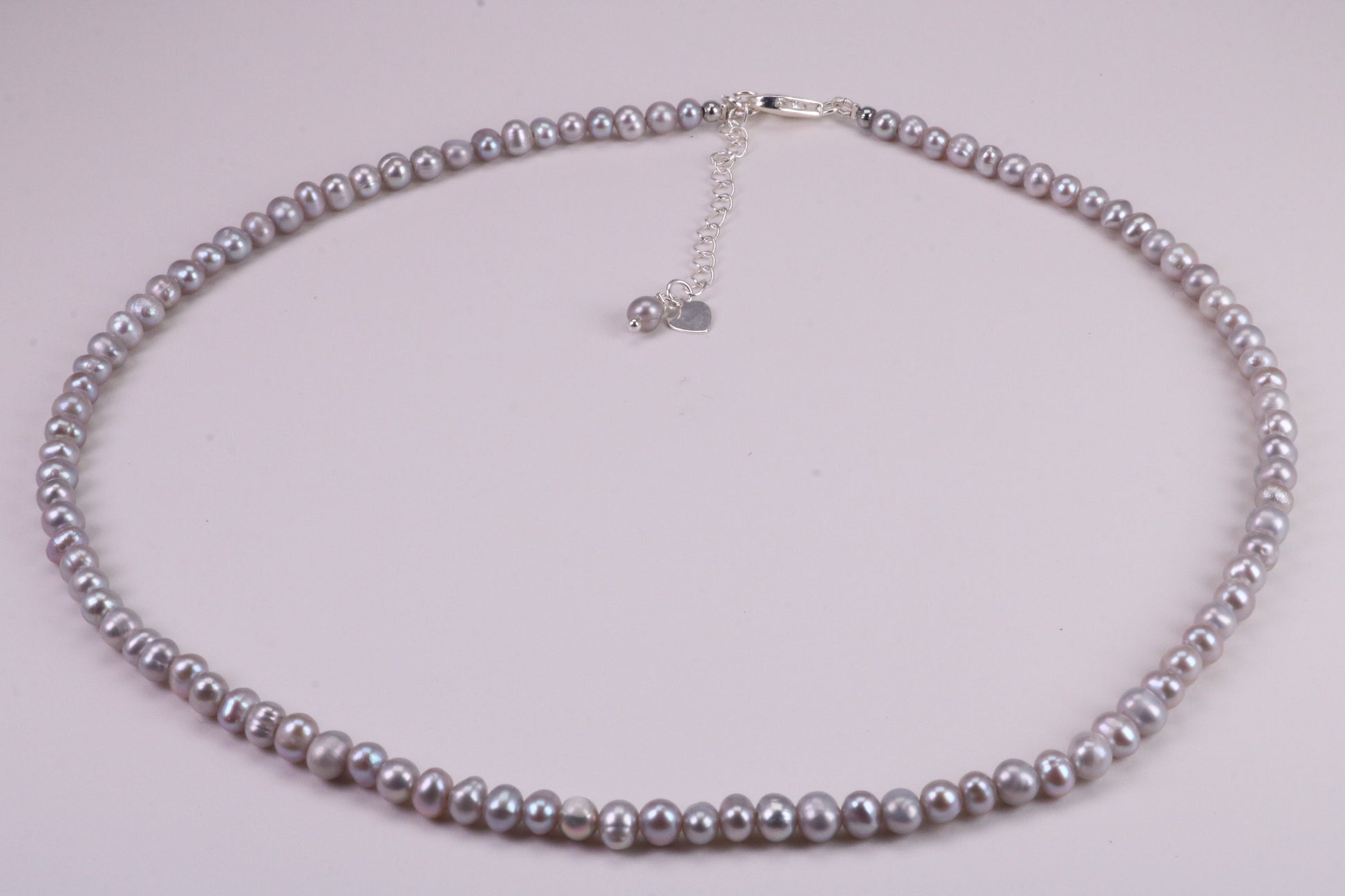 16 Inches Long Single Strand Natural 5 mm Round Grey Pearl Necklace set in Silver
