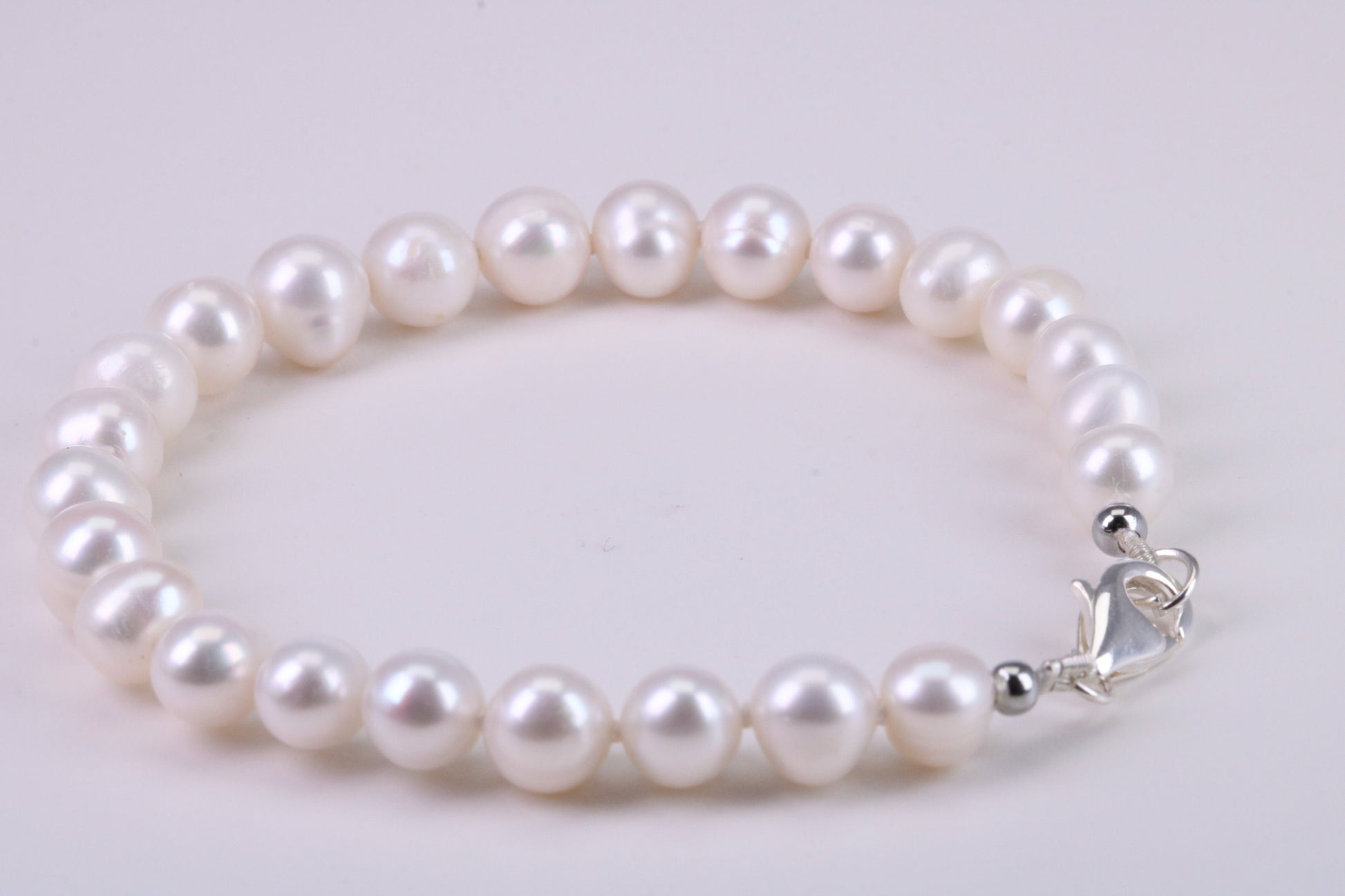 Natural 7 inches Long Pearl Bracelet, made from Sterling Silver