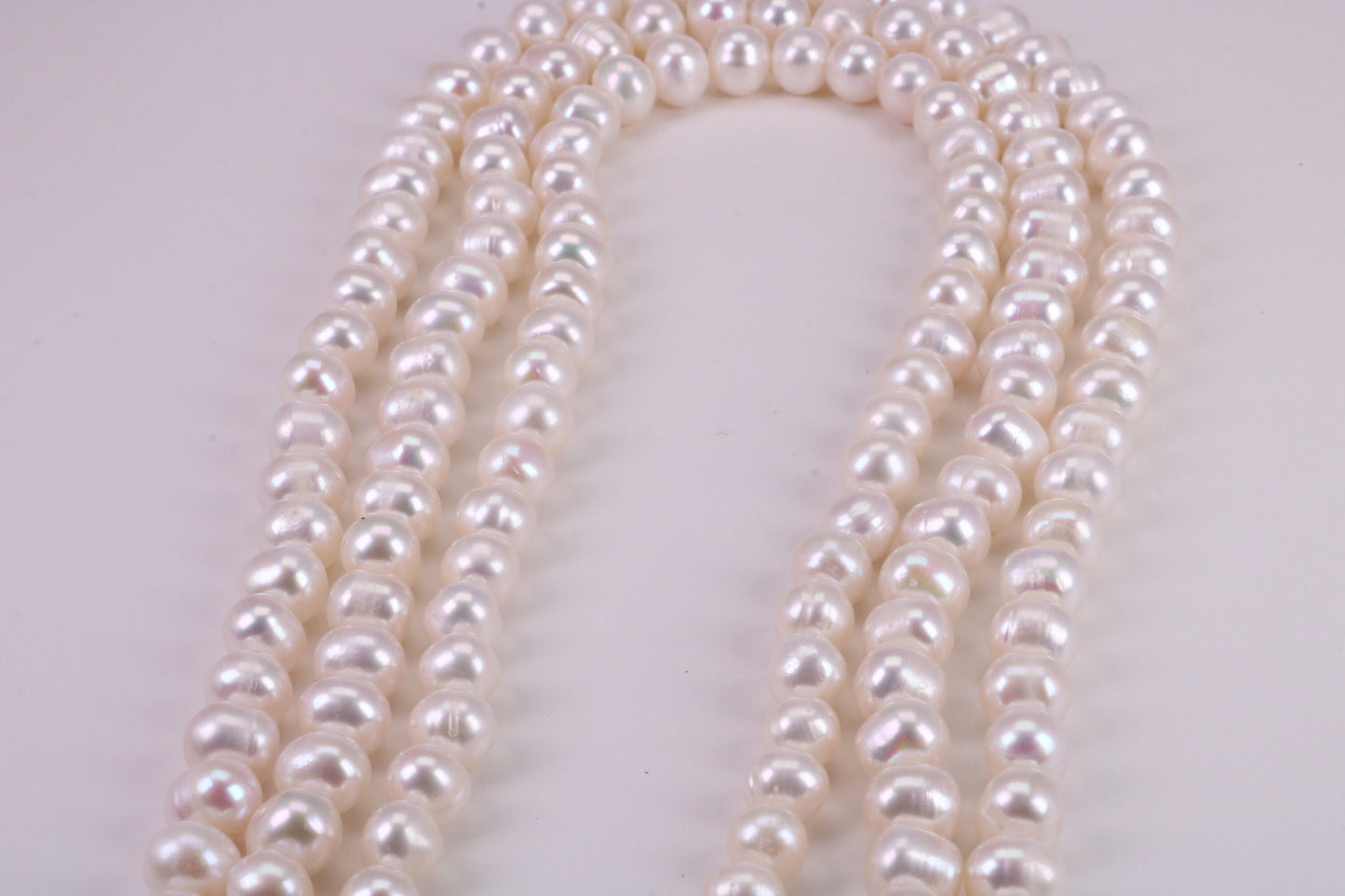 Three Strand Natural 7 mm Round Pearl Necklace set in Silver, Three Strands Measures 16, 18 and 20 inches Long