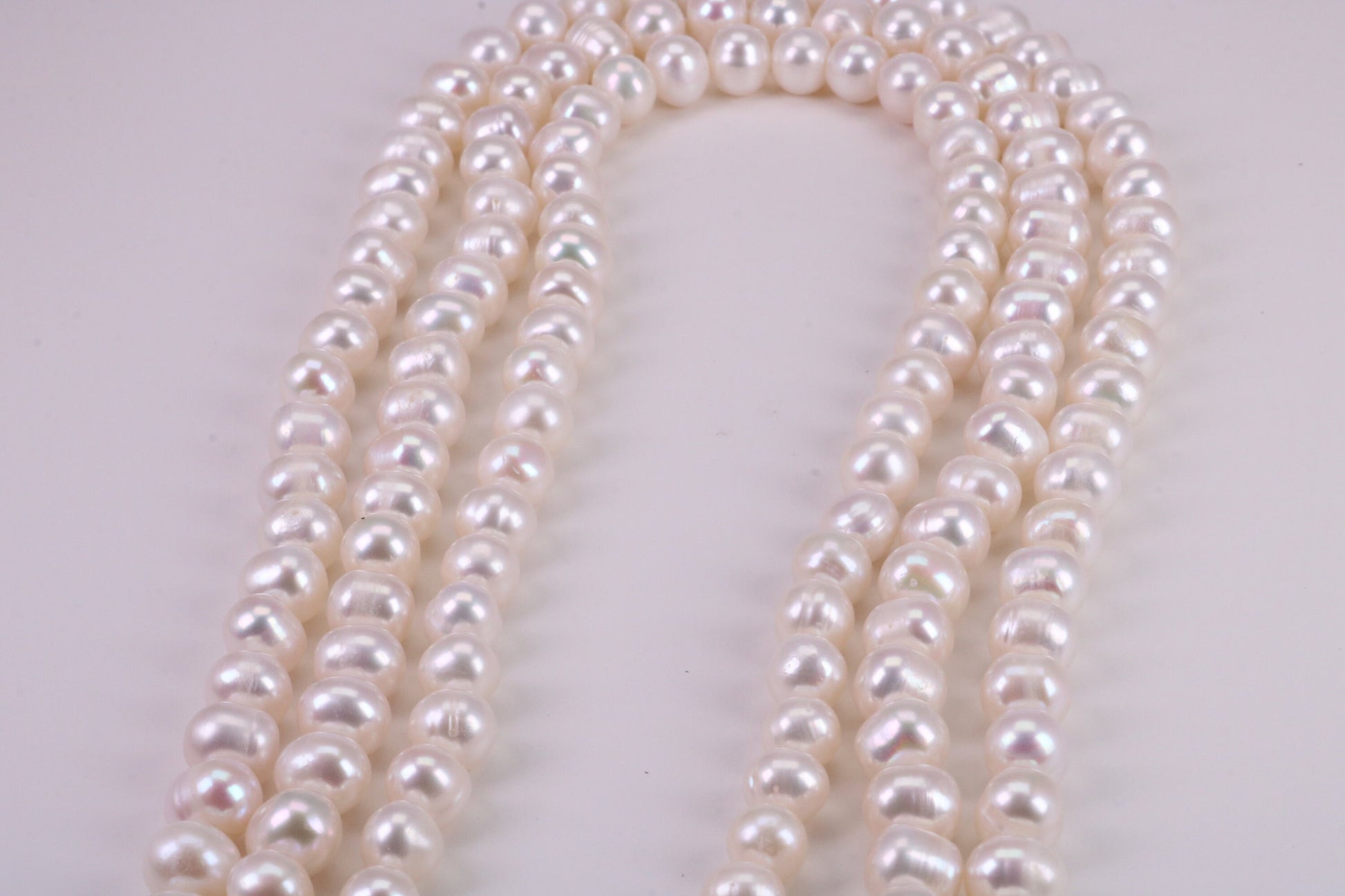 Three Strand Natural 7 mm Round Pearl Necklace set in Silver, Three Strands Measures 16, 18 and 20 inches Long