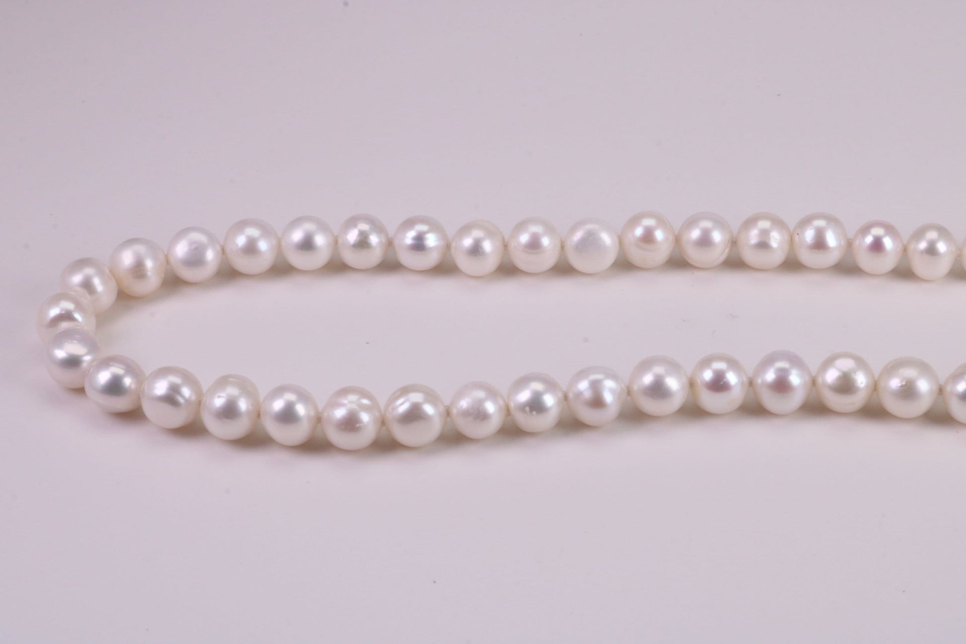 16 Inches Long Single Strand Natural 8 mm Round Pearl Necklace set in Silver