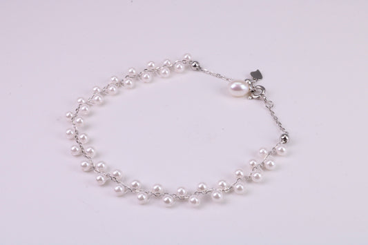 Natural 7.50 inches Long x 7 mm Wide Pearl Bracelet, made from Sterling Silver