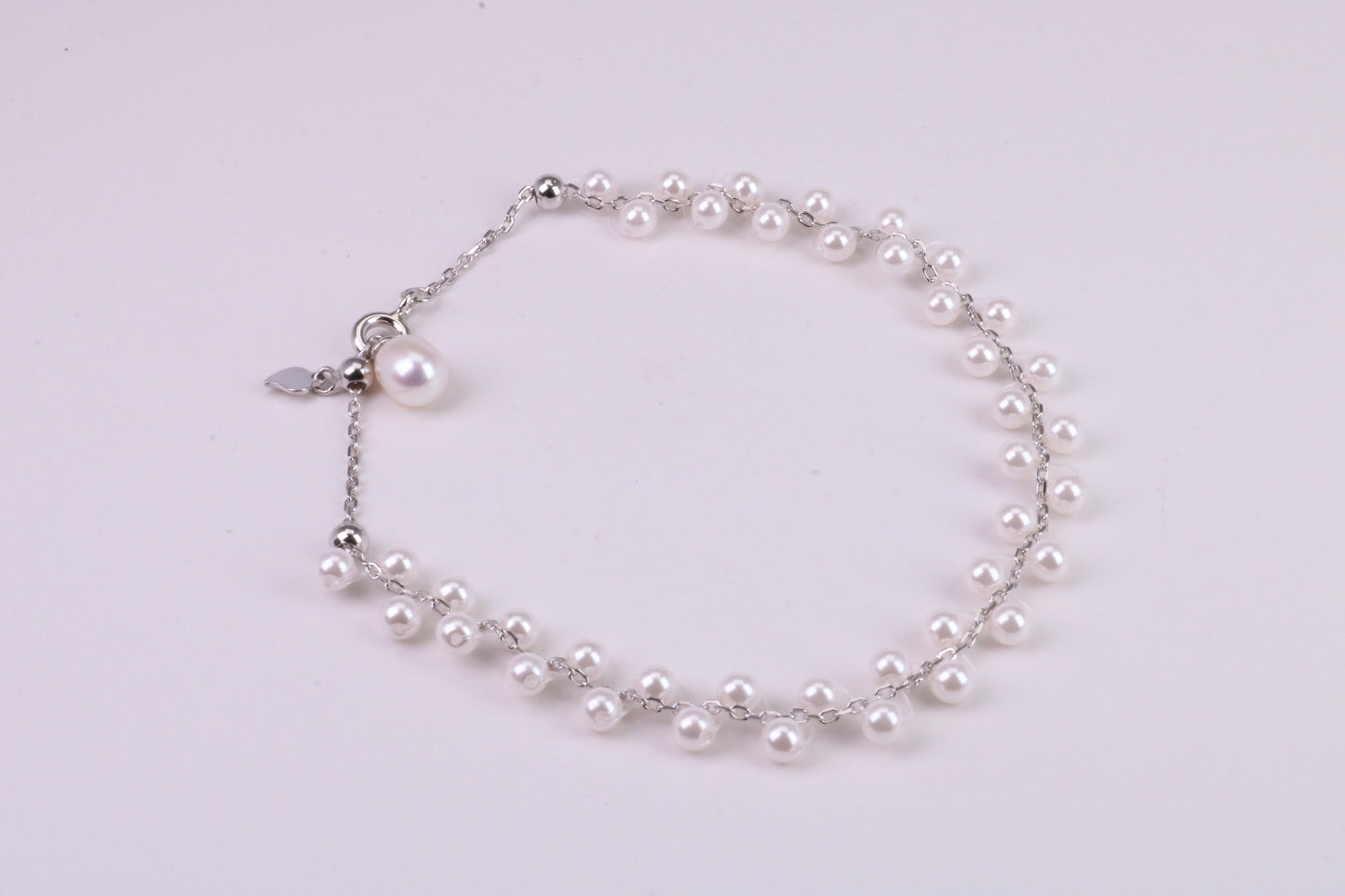 Natural 7.50 inches Long x 7 mm Wide Pearl Bracelet, made from Sterling Silver