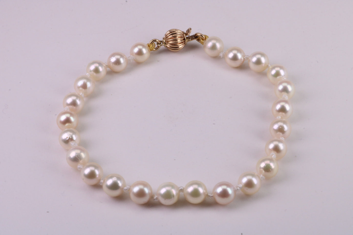 South Sea Simple 6 mm Round Natural Pearl Bracelet set with Solid Yellow Gold Lock